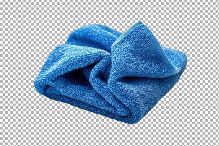PSD toalla suave de microfibra azul plegada cuidadosamente sobre una superficie limpia para la limpieza y el secado del hogar
