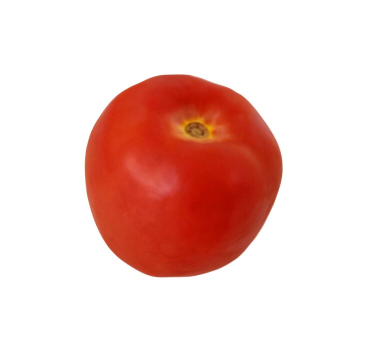 Tomate maduro aislado en el fondo blanco