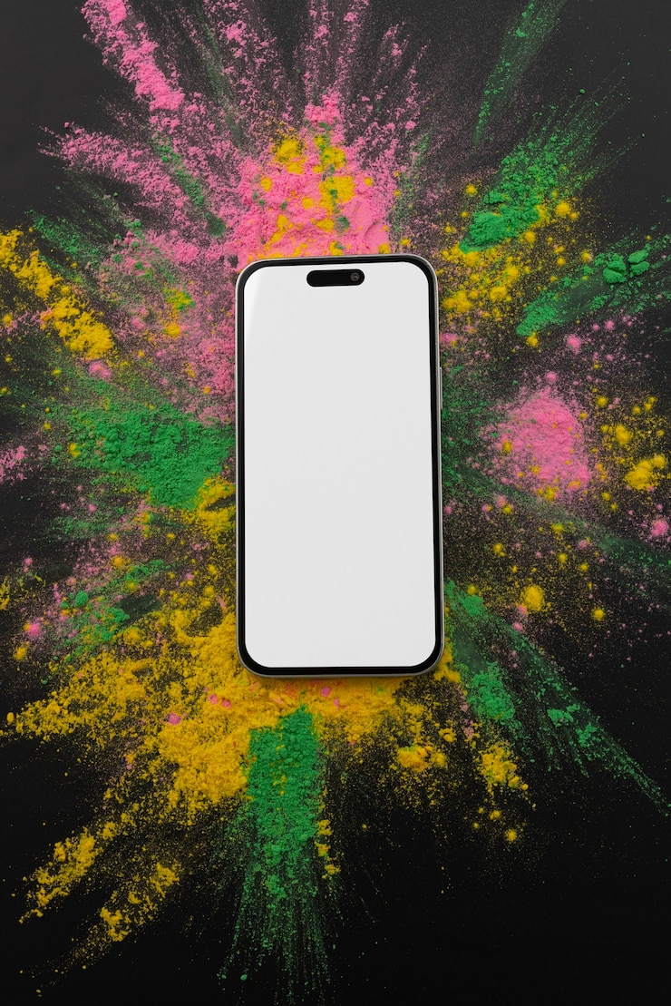 PSD top view del festival di holi con un modello di smartphone