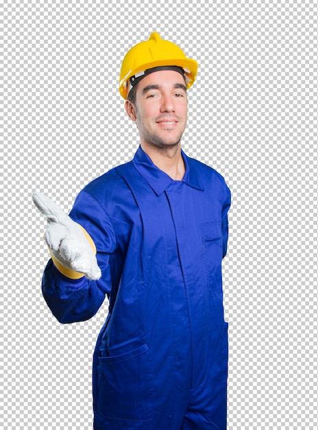 Trabajador feliz dando la bienvenida en el fondo blanco