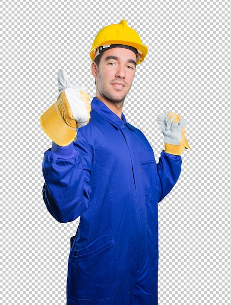 Trabajador feliz con un gesto bien sobre fondo blanco