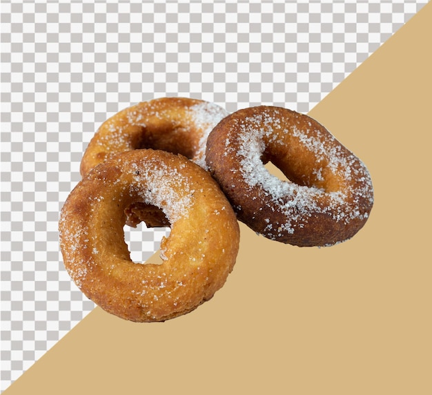 Tre ciambelle con zucchero in polvere sopra.