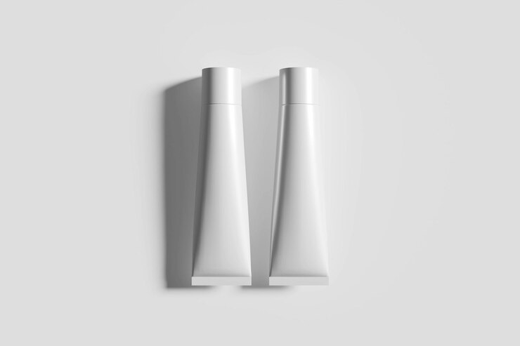 PSD trio of blank cosmetic tubes on a minimalist background