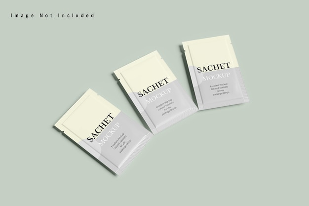 Trois paquets de thé en sachet sont sur fond vert.