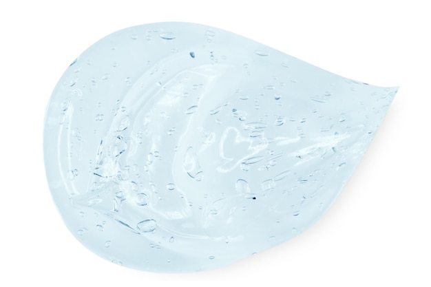 Uma grande mancha ou gota de um soro de gel azul transparente em um fundo transparente vazio