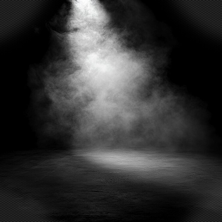 una stanza buia con una luce che splende sul suolo