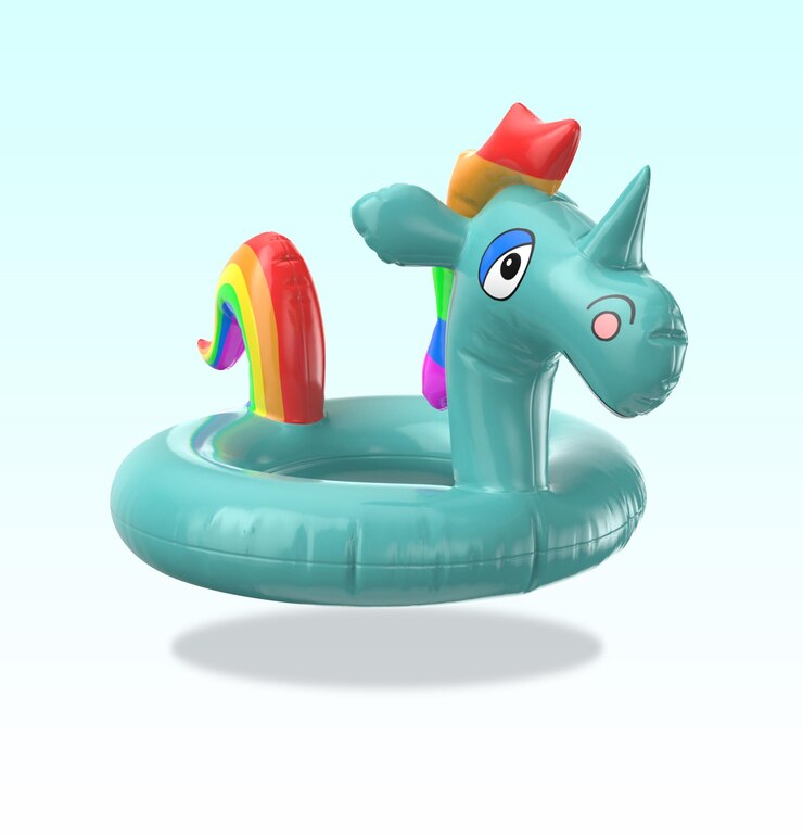 PSD un unicornio azul inflable con un lazo rojo.
