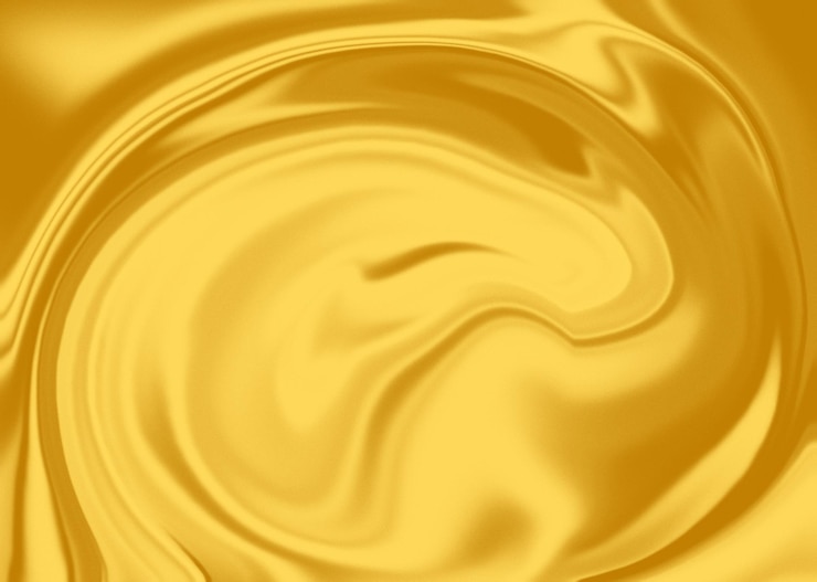 Uno sfondo con un liquido dorato