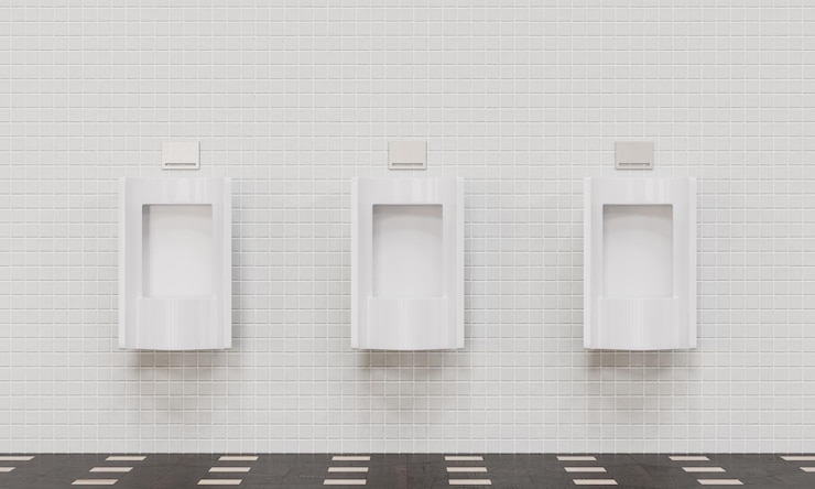 PSD urinario blanco en el baño de hombres limpio rendering 3d