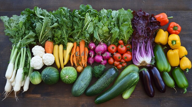 PSD una variedad colorida de verduras frescas en madera