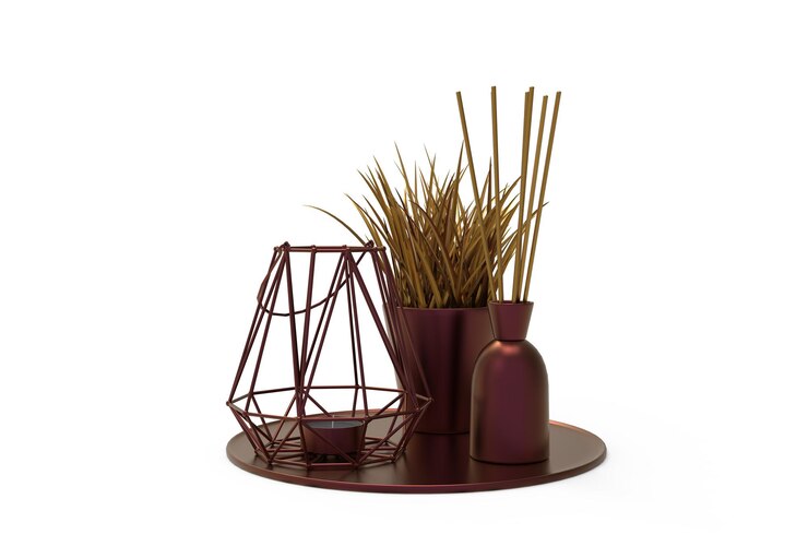 PSD un vase marron avec de l'herbe et une plante dans le coin.