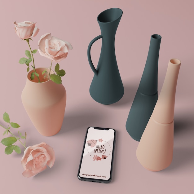 Vasi 3d con fiori accanto al cellulare