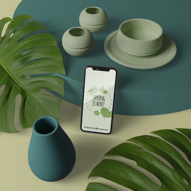 Vasi 3d con fiori accanto al telefono con mock-up