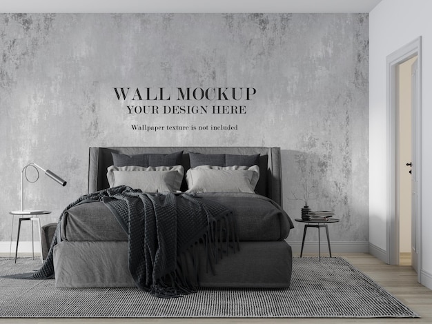 Verspotten sie die wand hinter einem modernen grauen bett mit minimalistischen möbeln