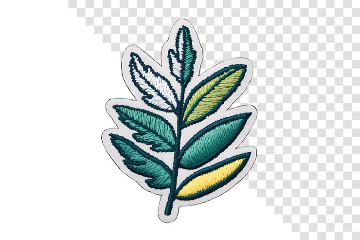 PSD vibrant embroidered leaf patch on light fabric