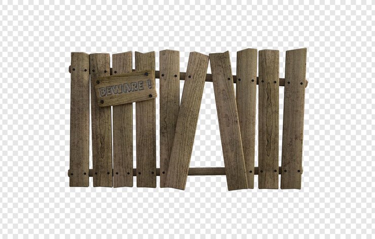 Vieja valla de madera con una señal de precaución