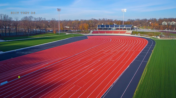 PSD vista aérea de una pista de atletismo y un estadio en un día soleado