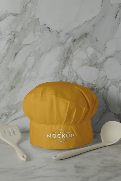 Vista de la maqueta de sombrero de cocina con fondo de mármol