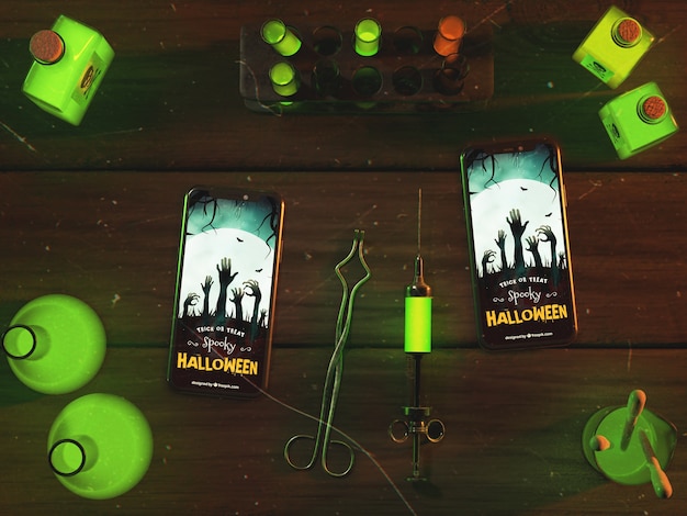 Vista superior arreglo de halloween con teléfonos inteligentes