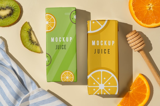 Vista superior deliciosa caixa de suco e laranja