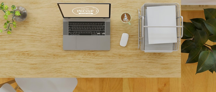 PSD vista superior do computador, laptop e bandejas de arquivamento de papel de escritório na mesa de madeira renderização em 3d