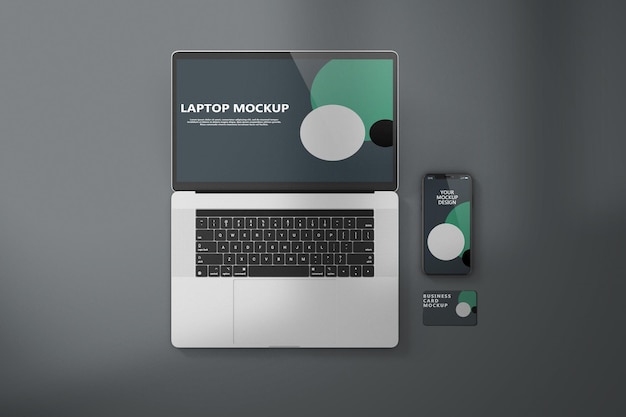 Vista superior Laptop Business Card y maqueta de Iphone