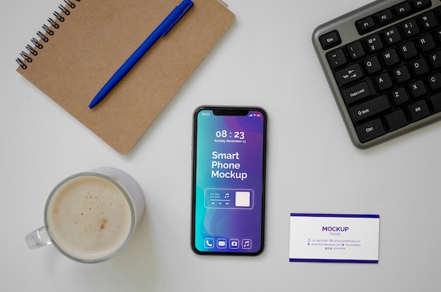 PSD vue de dessus sur la maquette du téléphone et de la carte de visite