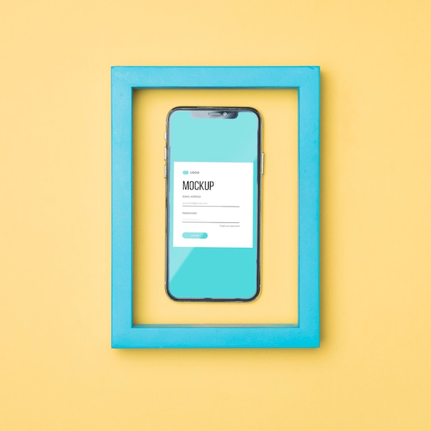 PSD vue de dessus smartphone dans une maquette de cadre bleu