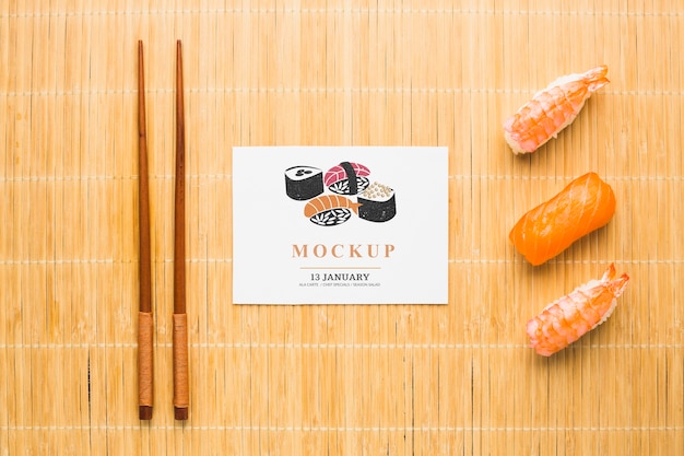 PSD vue de dessus des sushis avec des baguettes