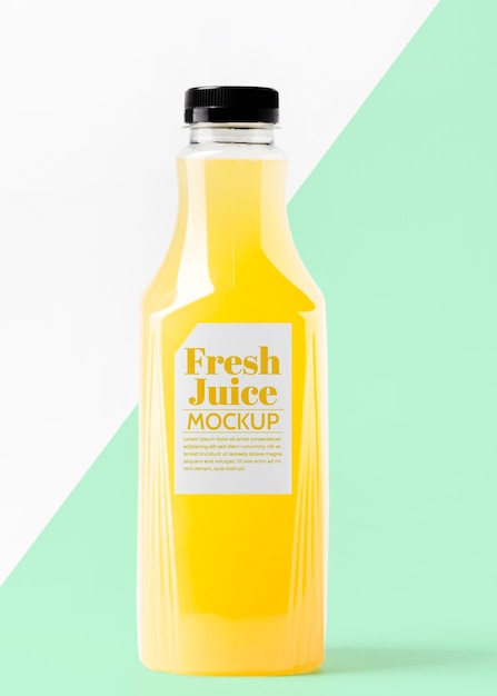 Vue de face de la bouteille de jus en verre
