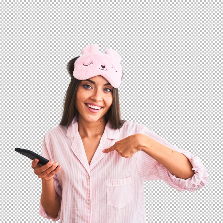 PSD woman in pajamas with sleep mask smiling and pointing at herself