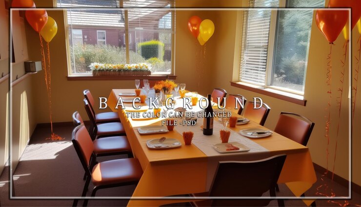 PSD yellow and orange balloons decorate a table set for a celebration
