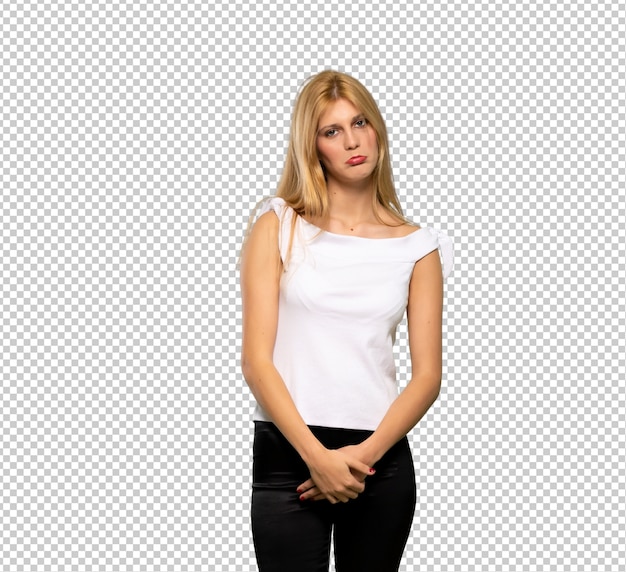 Young blonde woman with sad and depressed expression