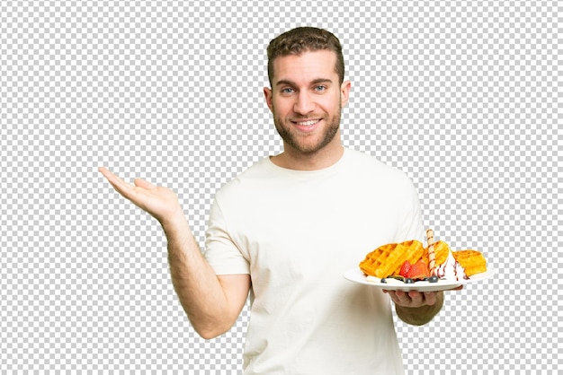 young handsome blonde man over isolated background