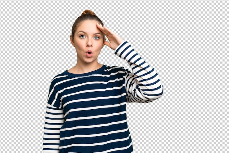 PSD young handsome blonde man over isolated chroma key background covering mouth with hand
