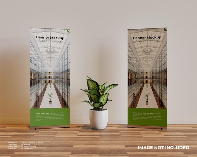Zwei Roll-up-Banner-Modell in der Innenszene mit einer Pflanze in der Mitte