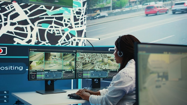 African american operator works on call center at shipping agency