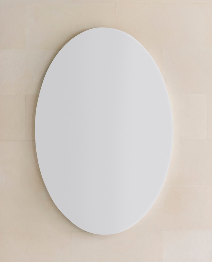 Ücretsiz Fotoğraf bir duvarda beyaz oval tabela maketi