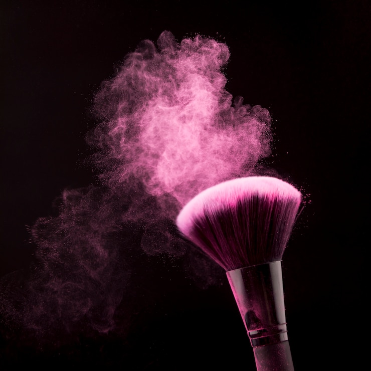 Ücretsiz Fotoğraf bright dust of powder and brush for makeup on black background