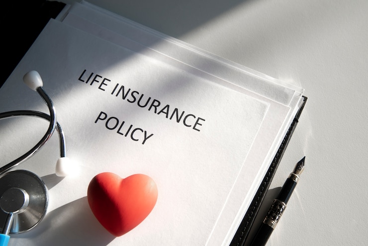 Ücretsiz Fotoğraf life insurance documents high angle