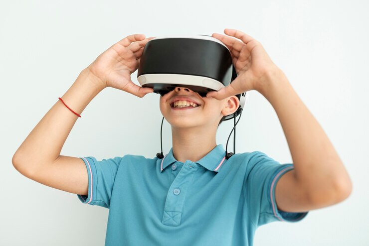 Ücretsiz Fotoğraf önden görünüm vr gözlüğü olan mutlu çocuk