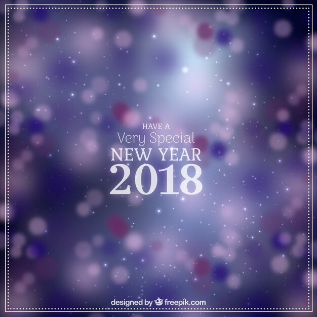 Arrière-plan flou nouvel an 2018 en violet