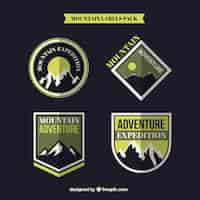 Vecteur gratuit badges d'aventure sur fond noir