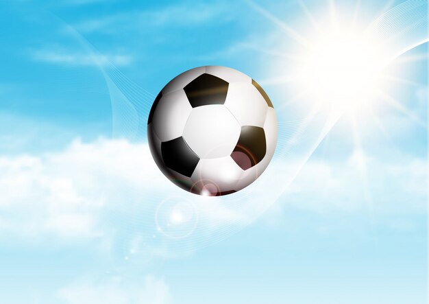 Ballon de soccer dans le ciel bleu