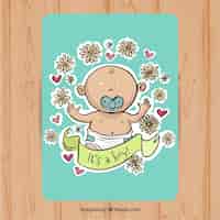 Vecteur gratuit belle carte de baby shower avec garçon mignon et décoration florale