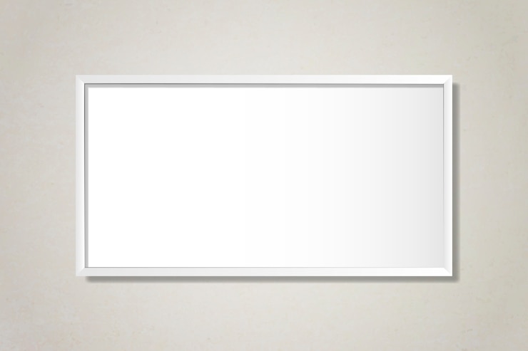 Vecteur gratuit un cadre blanc sur le mur.
