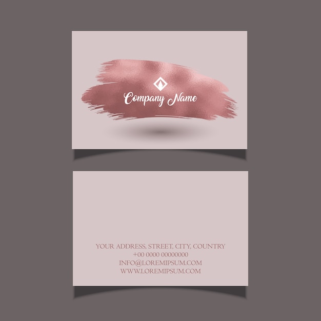 Vecteur gratuit carte de visite élégante avec un design de trait de pinceau en or rose