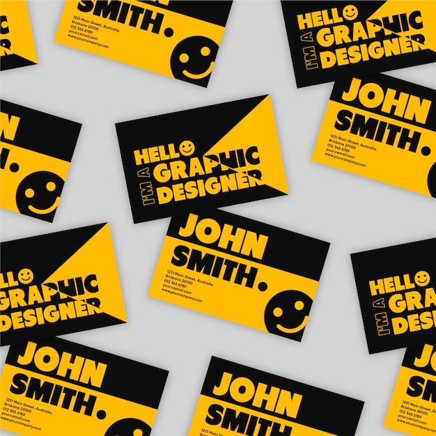 Vecteur gratuit carte de visite de graphiste en noir et orange avec visage souriant