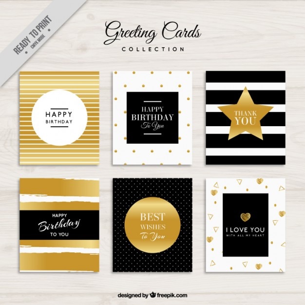 Vecteur gratuit cartes de voeux décorées avec des éléments d'or