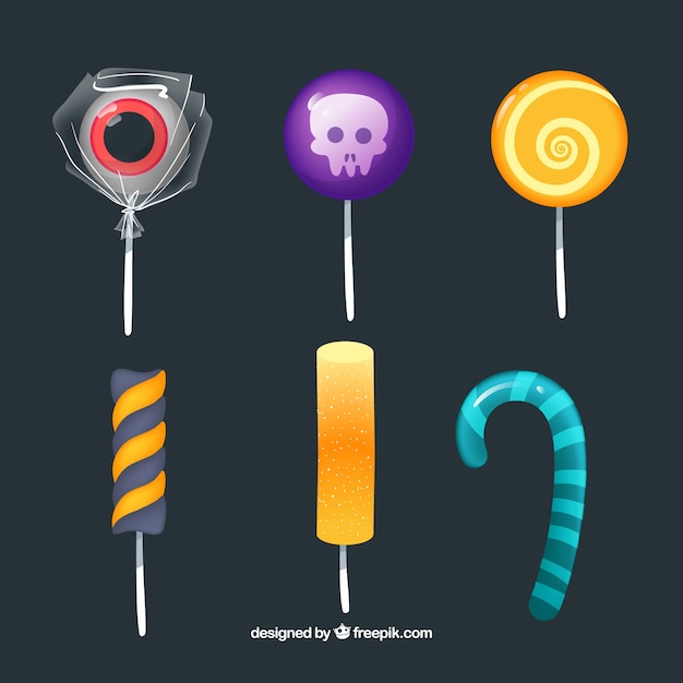 Vecteur gratuit collection de bonbons colorés d'halloween avec un design plat